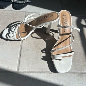 Wild Pair White Heeled Sandals Sleek Design